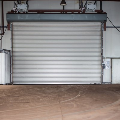 Building with roller shutter door